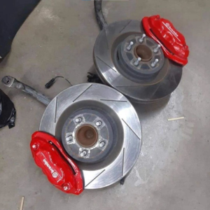 4 piston Brembo brakes with rotors, spindles and brake lines